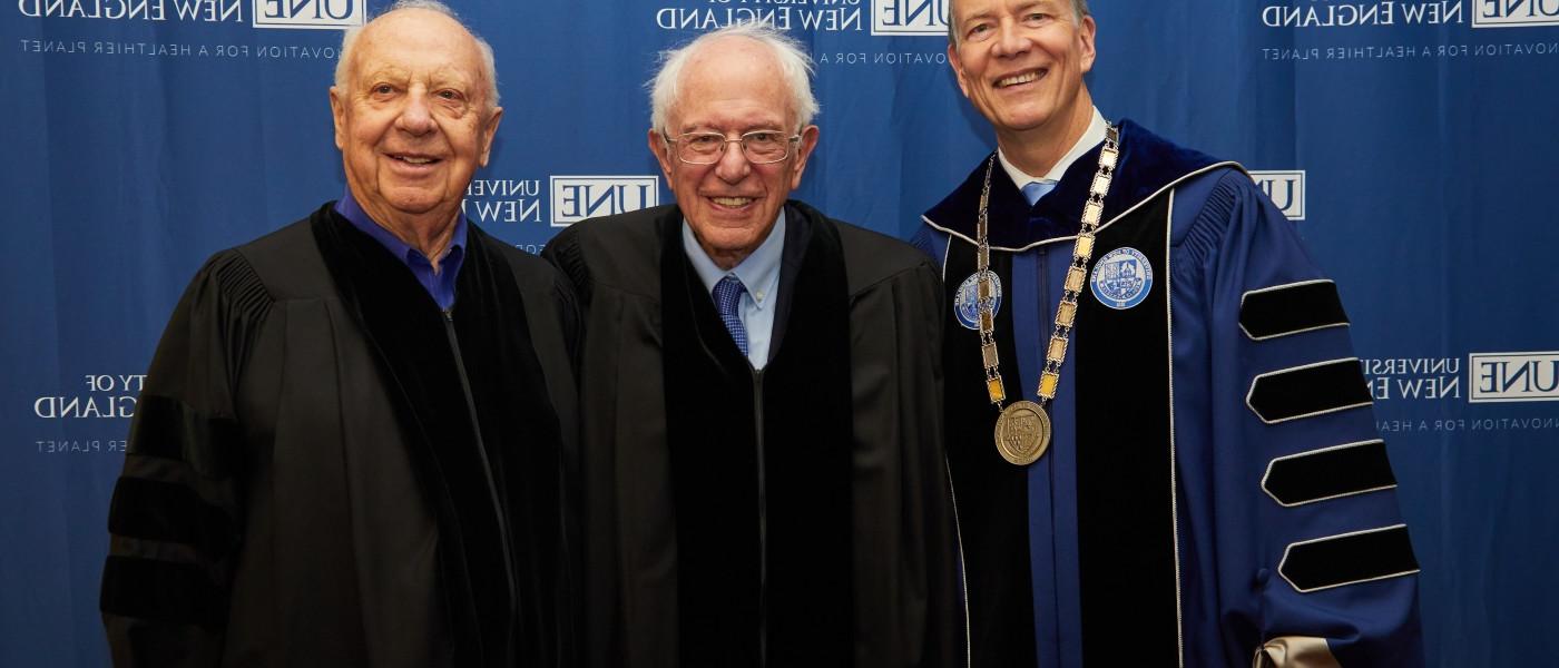 UNE President James Herbert poses with Bernie Sanders and Art Girard